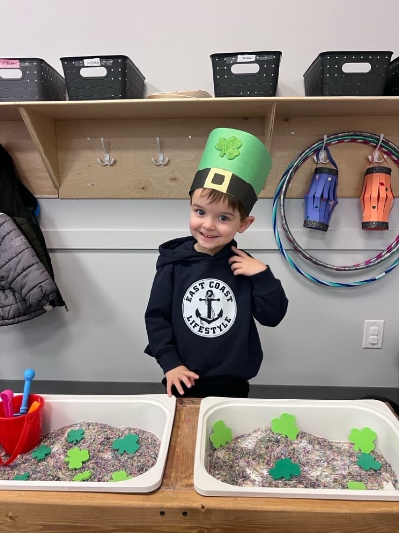 Smiling child during a themed classroom activity