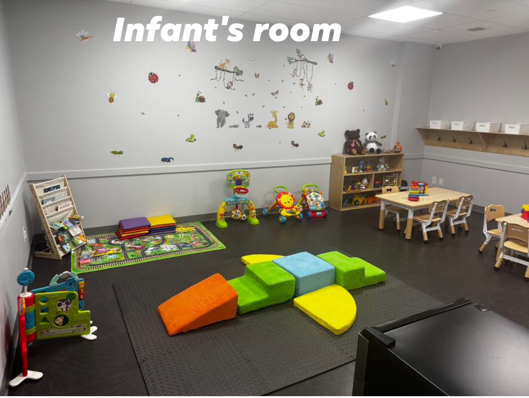 Infant classroom prepared for quiet routines and sensory invitations